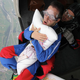 Illustration for article titled Pure Nerd Insanity: Two Men Skydiving with a Girly Hug Pillow